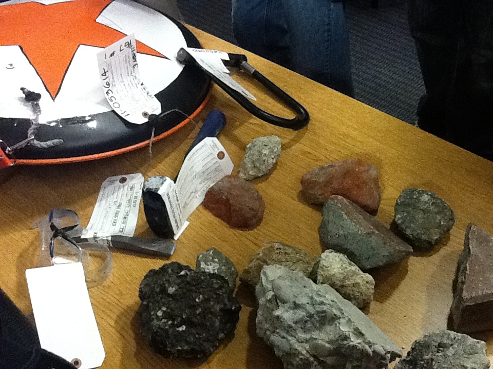 These are some items police picked up during Wednesday night's clash in Oakland, Calif., including a shield, sledge hammer and rocks. About 7,500 protesters participated in a general strike and shut d
