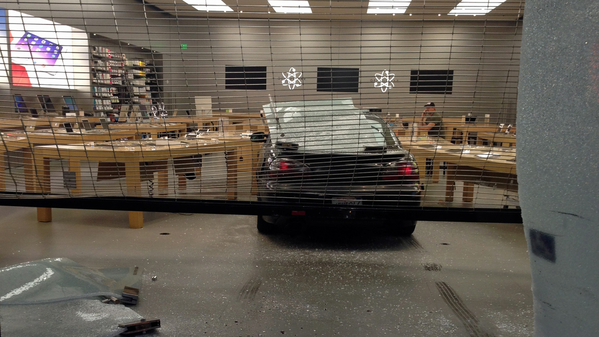 A suspect drove through the glass windows of the Apple store in Berkeley early Friday morning, May 9, 2014, and made off with store merchandise, police said.