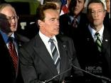 Schwarzenegger Goes With Hand Out to Obama