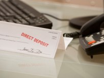 Paychecks Shrink to Beef Up State Coffers