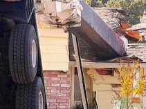 Tree-Trimming Mishap Is a Home Wrecker