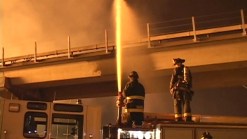 Raw Video: Fire Burning Near West Oakland BART Stop