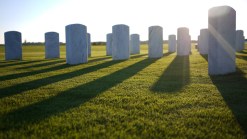 Man Works to Correct Headstone Error