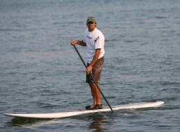 Surfing with a Paddle