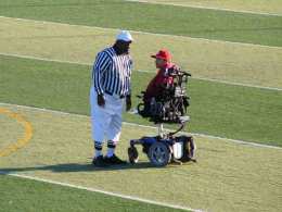 Born With No Arms or Legs, Football Coach Inspires Team