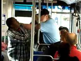 YouTube Transit Brawl 3: Man Bloodies Younger Passenger