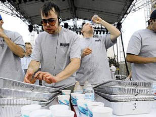 Joey Chestnut Takes it in the Gut at Rib Contest