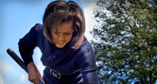 First Lady Rolls Up Sleeves for White House Garden