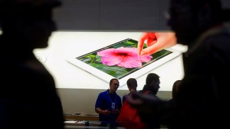 Apple Opens Up Wallet, Spends Some Cash