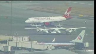 Raw Video: Richard Branson' Spaceship Lands at SFO
