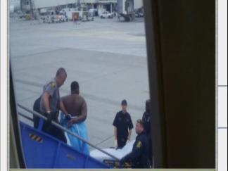 Naked Passenger Aborts Flight