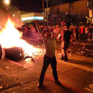 Fans Flood Streets, Light Fires Sunday Night