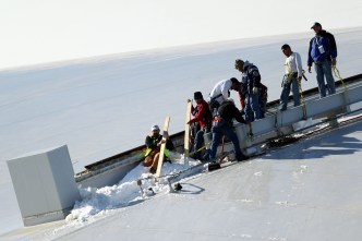 Fire Department Clears Ice from Stadium Roof Saturday