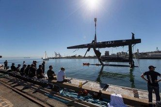 Oracle Catamaran Being Hoisted Out Of Bay