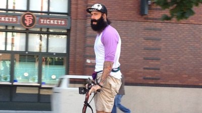 Brian Wilson Rides Scooter to Work in Air Mags