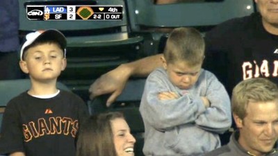 Young Giants Fan Pouts After Whiffing Ball