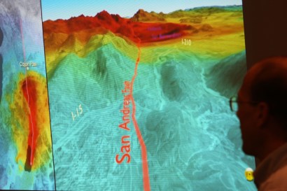 Research geophysicist shows members of the media a series of shock waves images Research geophysicist shows members of the media a series of shock waves images