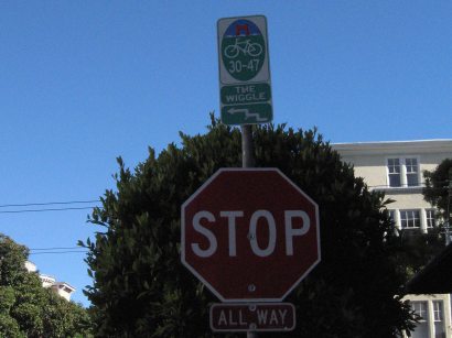The four way stop at Duboce and Steiner in San Francisco is a popular route for cyclists, who tend to roll past the stop signs -- as do drivers. The four way stop at Duboce and Steiner in San Francisco is a popular route for cyclists, who tend to roll past the stop signs -- as do drivers.
