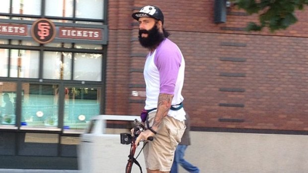 Brian Wilson Rides Scooter to Work in Air Mags