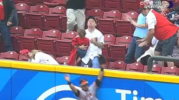 Fan Catches Home Run While Holding Baby