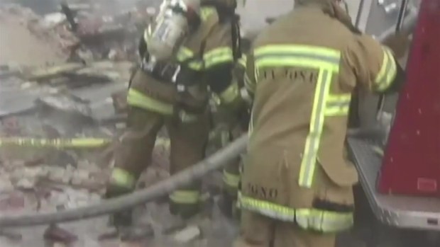 RAW VIDEO: Building Collapses on San Jose Firefighter