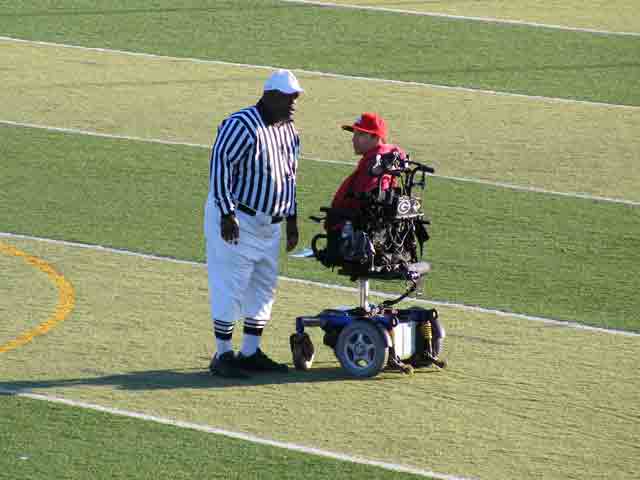 Born With No Arms or Legs, Football Coach Inspires Team