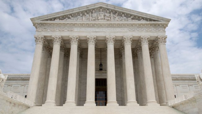Attention on Supreme Court as justice weigh Trump travel ban