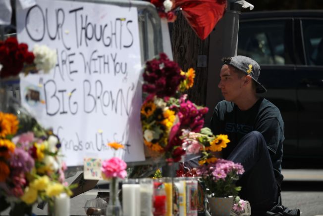 UPS staff return after three warehouse workers shot dead