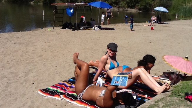 For the first time this year park workers at Oakland's Lake Temescal pulled out the swimming ropes as temperatures hit near-record highs Friday.