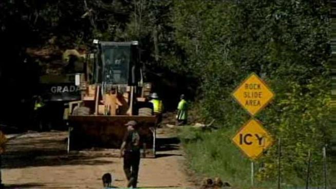 Families gather a meeting to find out that their homes could in the way of land slides.