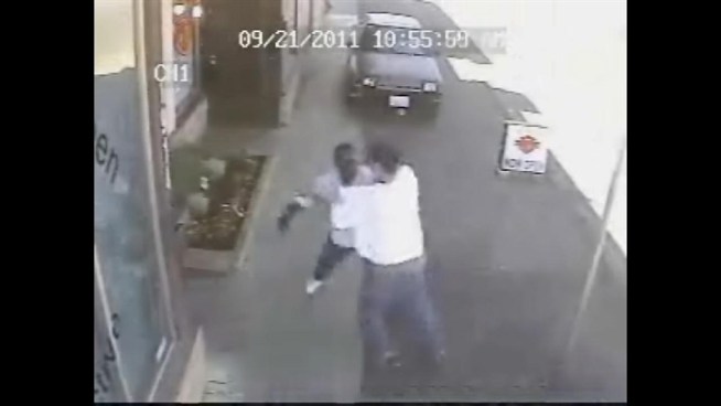 This street fight, caught on a surveillance tape, escalates quickly when one man pulls out a gun. How many felonies can you count?