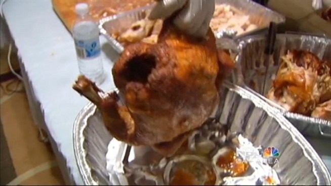 Cheryl Hurd visits a family in Oakland as they prepare Thanksgiving dinner for hundreds of strangers.