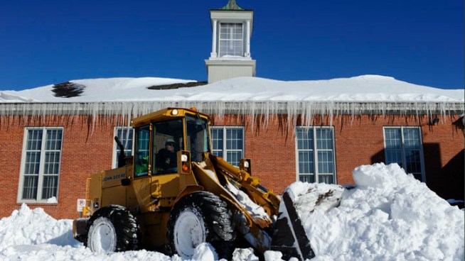 Crews from around the US and Canada are heading to New England, to help restore power to the more than 100,000 homes and businesses in the dark and cold. Numerous roads remain blocked by snow in Connecticut.