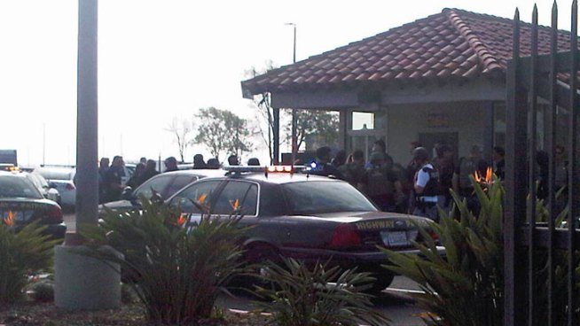 Military personnel call San Diego police reporting a possible sighting of manhunt suspect Chris Dorner along North Harbor Drive. This is raw video of the response to Naval Base Point Loma around 10 a.m. Thursday. 