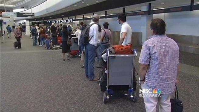Hurricane Irene causes many cancellations and strands passengers at San Francisco International Airport.