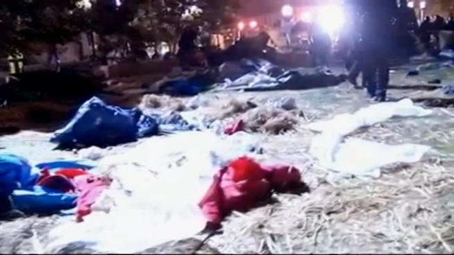 Police began to tear down tents at Occupy Oakland Tuesday morning.