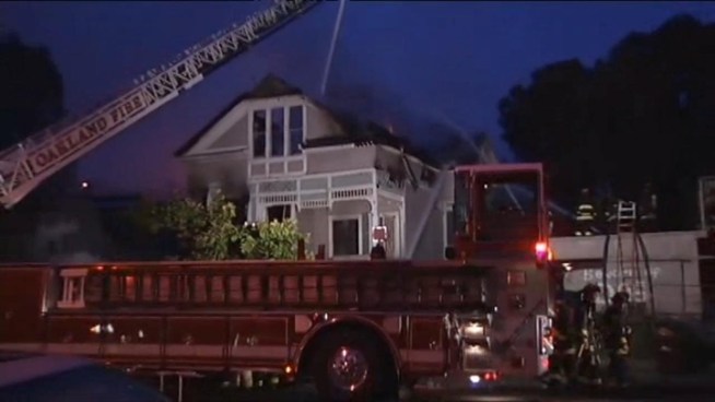 Oakland firefighters control a blaze on Martin Luther King Way and 29th Street.