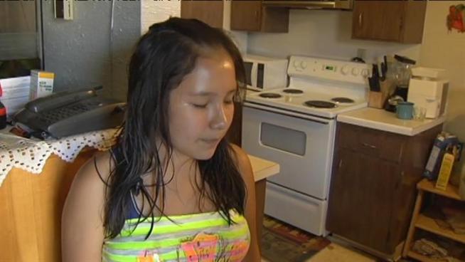 A teenager saved her 3 year old sister from being kidnapped after a woman tried to take her from her own home.