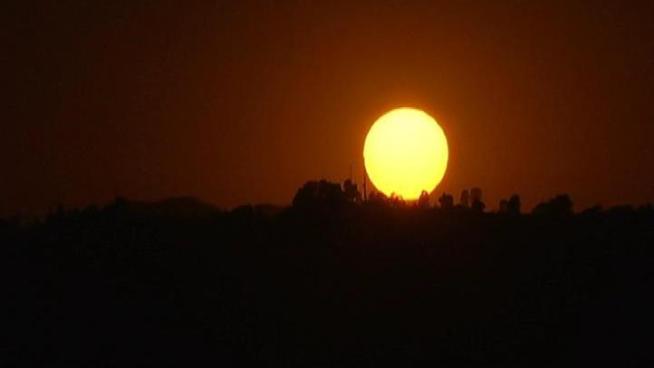 The largest solar storm in five years is heading toward Earth, threatening to unleash a torrent of charged particles that could disrupt power grids, GPS and airplane flights.