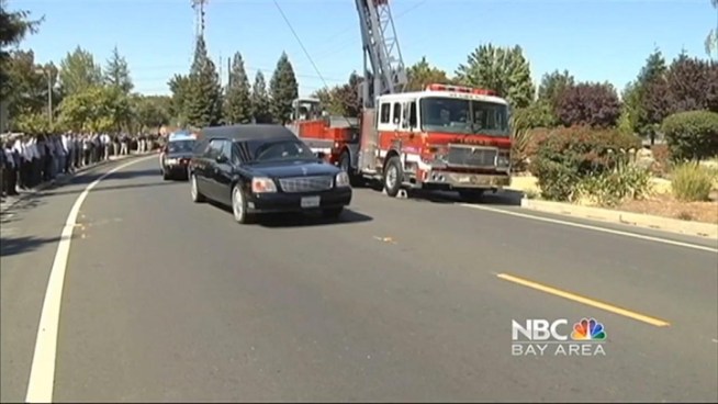 A silent and moving tribute today for the Kenyon Youngrstrom took place as the officer's body was transported to a funeral home, Monday. Friends, off duty first responders and workers lined the route.
