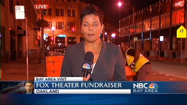 Over 100 protesters marching in the streets near Oakland's Fox Theater this evening where President Obama is expected to speak tonight burned a sign welcoming the president to town along with a U.S. flag.