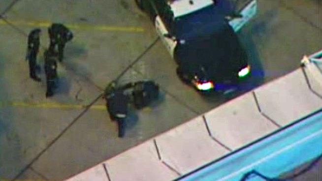 San Diego police, Harbor police and military police were called to Lindbergh Field after a man ran on the tarmac early Thursday. This is raw video of the incident.