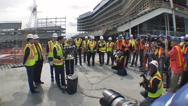 The San Francisco 49ers want to host the 2016 Super Bowl and they re using teamwork to help make it happen. With the rising stadium as a backdrop, the Niners invited Bay Area mayors to show their support for what the team says will be a boon to the Bay Area regional economy. Kris Sanchez reports.
