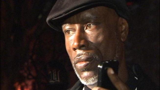 Bobby Johnson, Oscar Grant's uncle, reacts after receiving a call notifying him of Johannas Mehserle's release from jail.