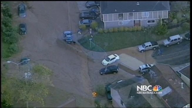It is one of the most bizarre accidents we've seen, a peninsula neighborhood is buried in mud. Tonight, they're digging out and hosing off. The mudslide was caused by a water main break which dumped about 45,000 gallons of water into a Daly City neighborhood. NBC Bay Area's Kris Sanchez was live at the scene.