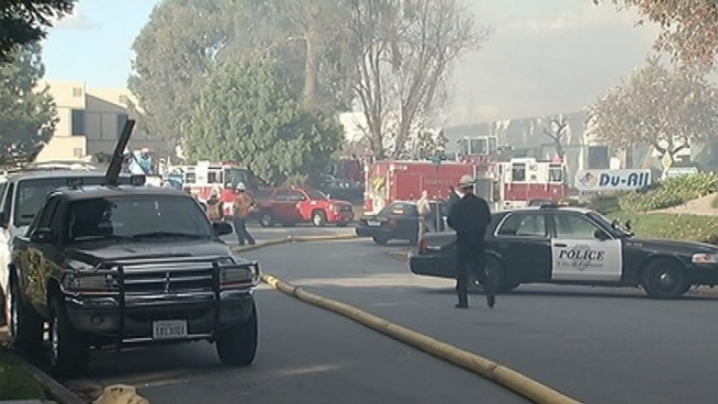 Fremont firefighters remained at the scene of a three-alarm fire  in the city's Warm Springs neighborhood this afternoon, a fire captain said. George Kiriyama reports.