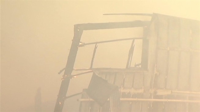 An empty warehouse burns to the ground in Vallejo Sunday.