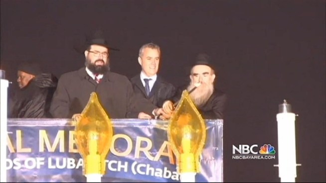 Chabad rabbis in Washington, D.C. light the menorah on Sunday night in honor of the Jewish holiday of Hanukkah.