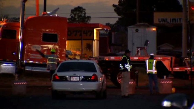Federal investigators are in Midland trying to determine how a train slammed into a parade float that was carrying wounded veterans, killing four and injuring 16.