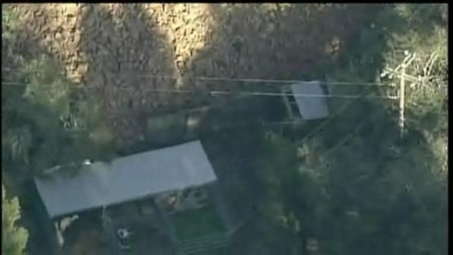 Raw video of the rockslide that trapped dozens in <a title=